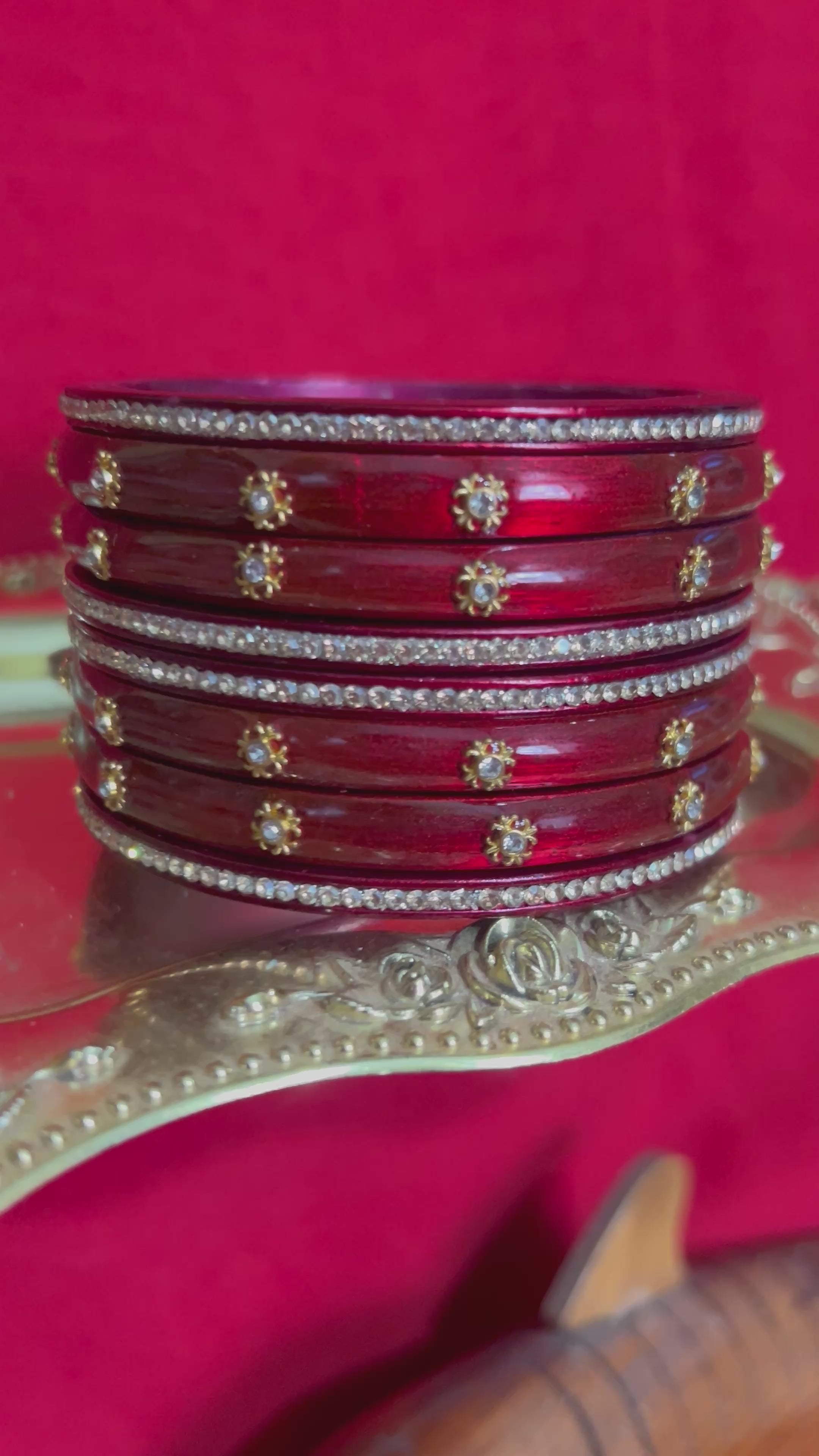 Designer Maroon-Red Lah Bangles Set - Gold Star Motifs